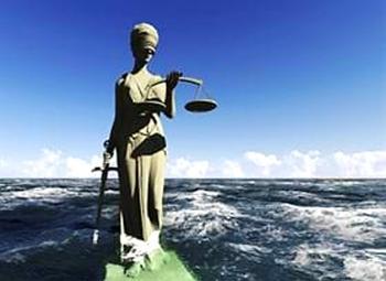 A statue of a lady justice