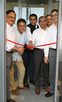 CRS Consulting new office_cutting the ribbon.png